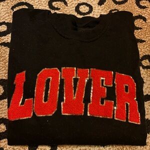 Amazon Black Sweater with Red Lettering